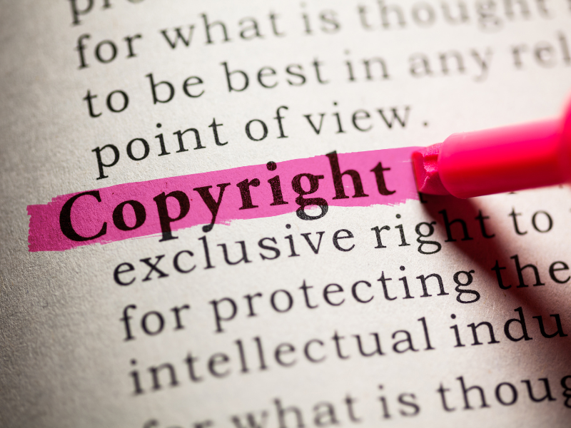 what does royalty free mean? Pic of the word copyright highlighted in a book.