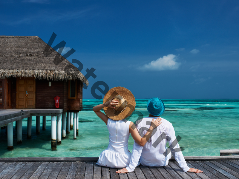 what does royalty free mean - picture of a couple on the beach with a watermark
